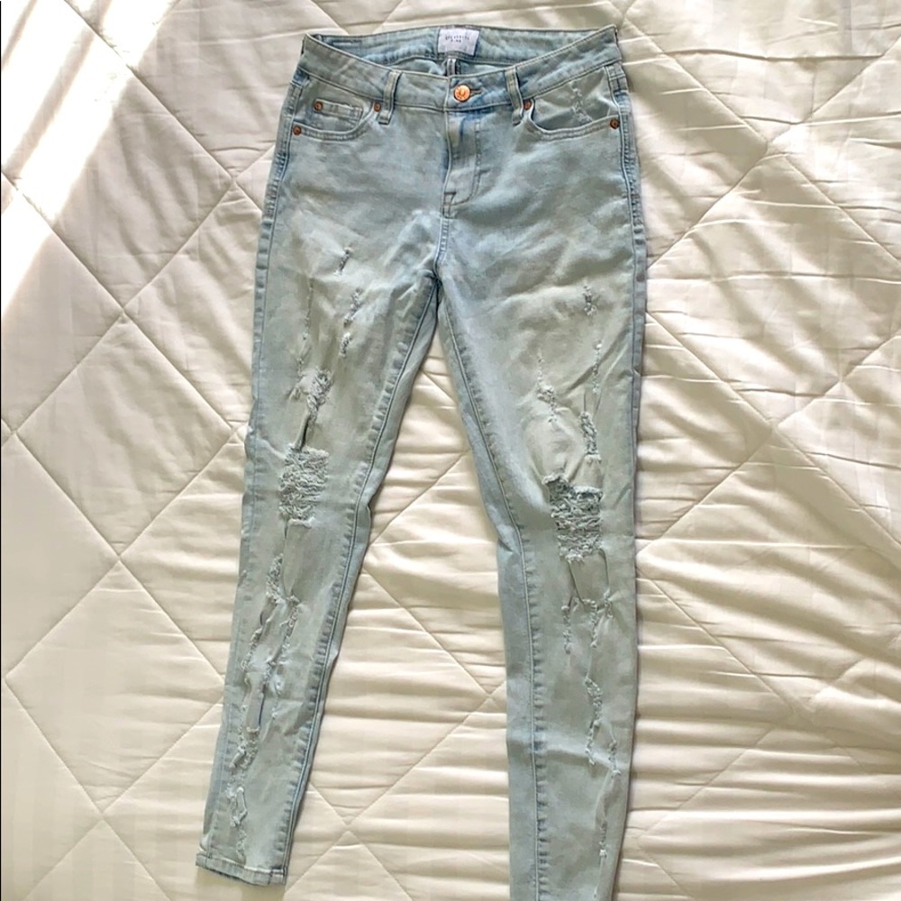 Light wash midrise ankle skinny jeans
